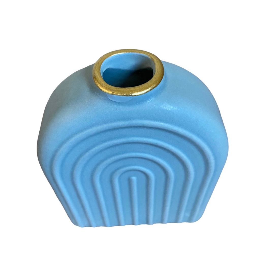 New blue ceramic rainbow arch vase with gold rim.